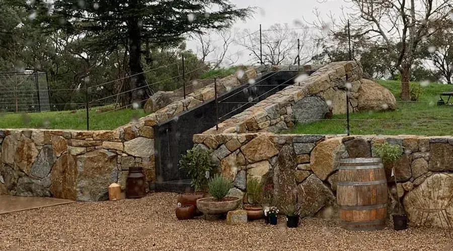 Large rock retaining wall